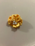 Yellow brooch