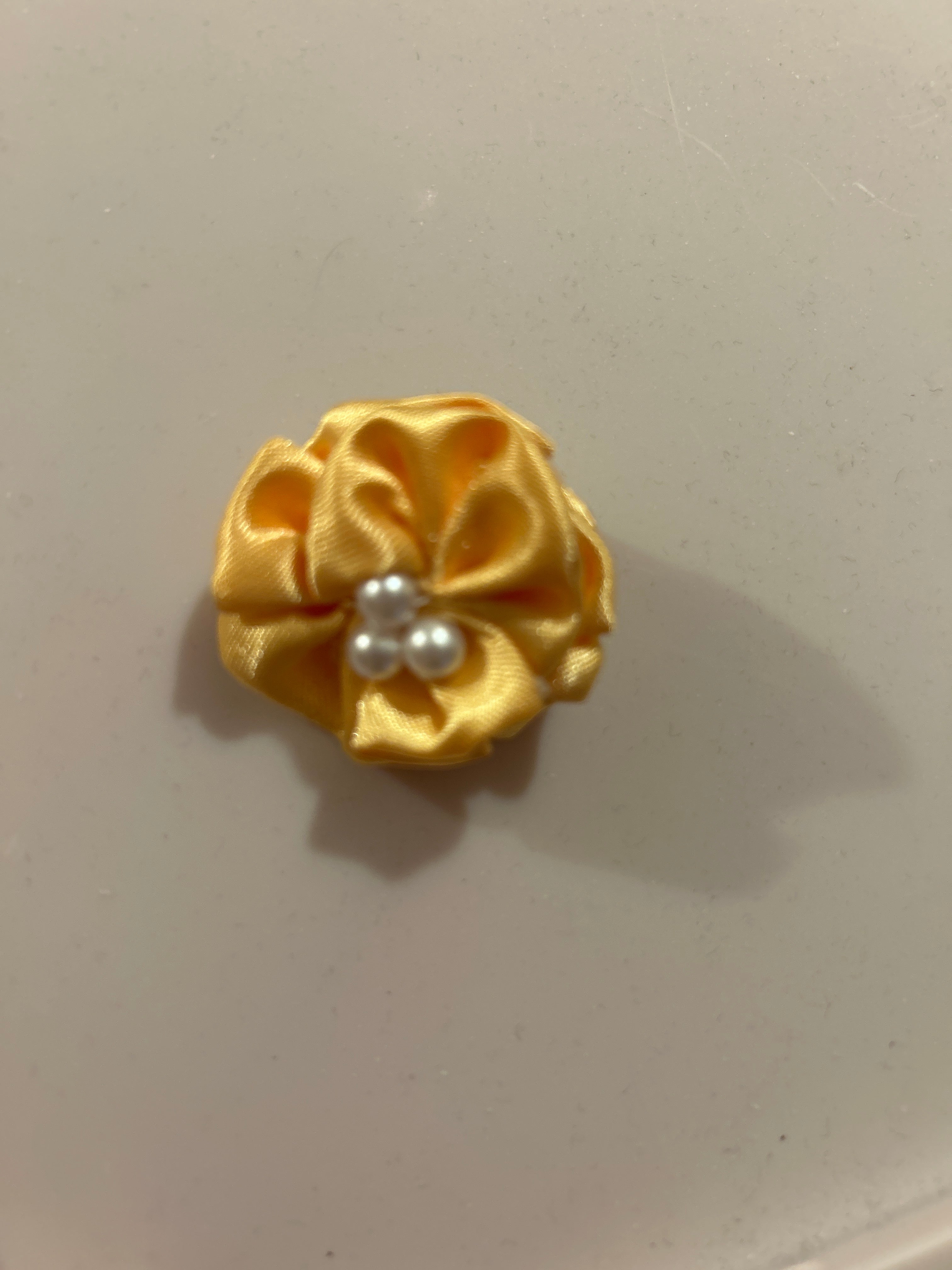 Yellow brooch