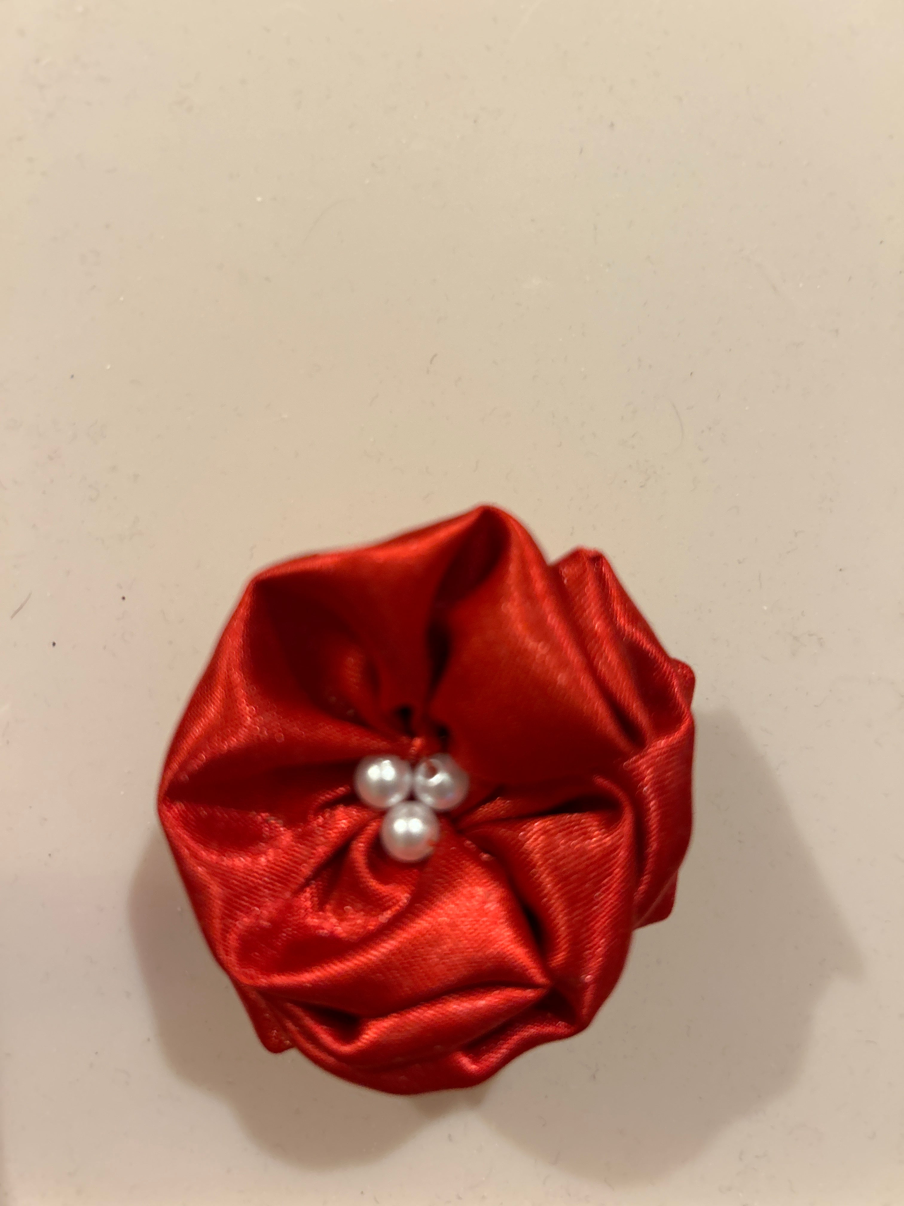 Red brooch